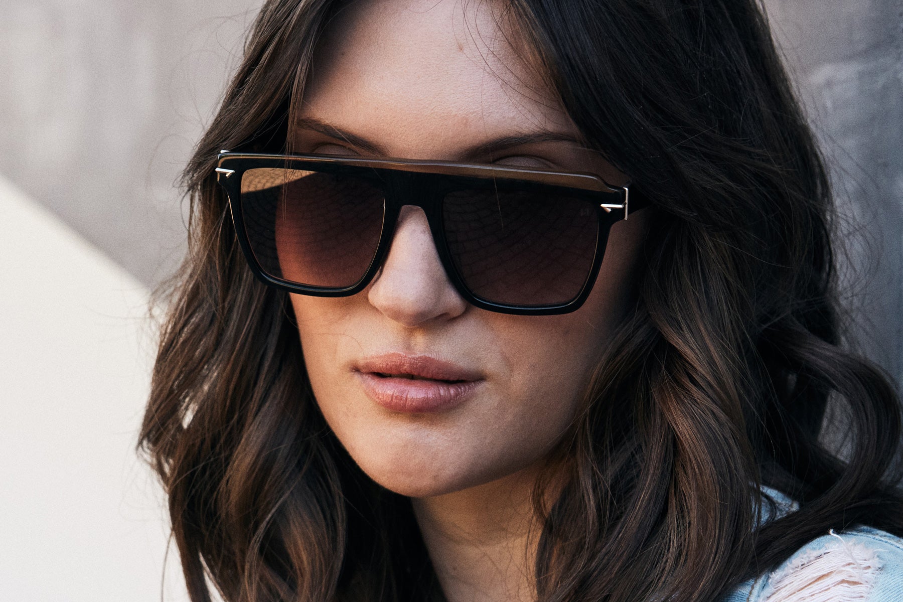 Fashionable Woman wearing retro Sunglass in Black