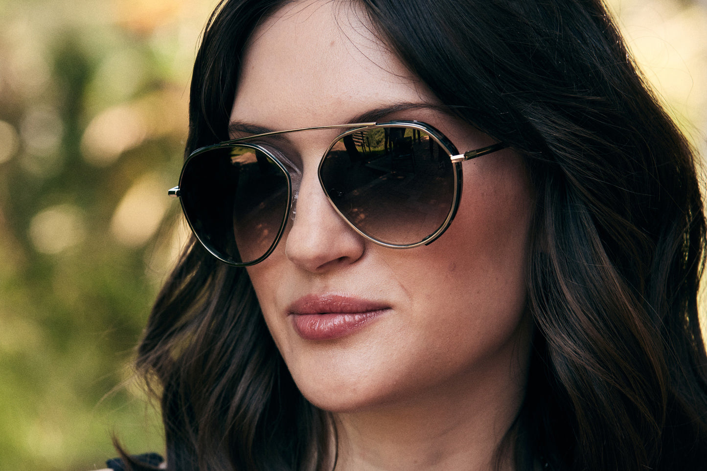 Woman wearing Pilot Sunglass with Adjustable Nosepads