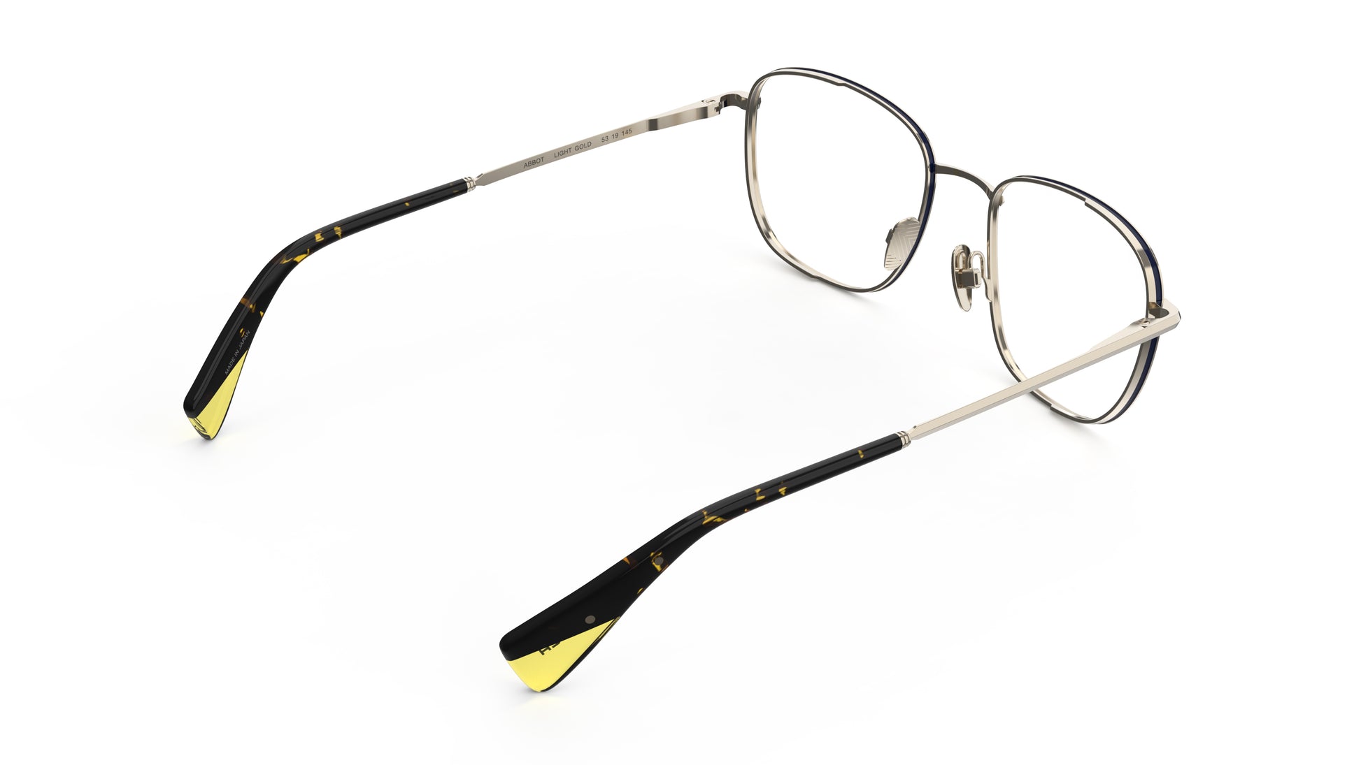 Rear view soft square tiatnium eyeglasses featuring a gold front and temples with a tortoiseshell pattern and yellow tips, shown on a white background.