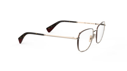 A pair of classic-style titanium eyeglasses with an almond-toned construction, nosepads and integrated spring hinge, shown on a plain white background.