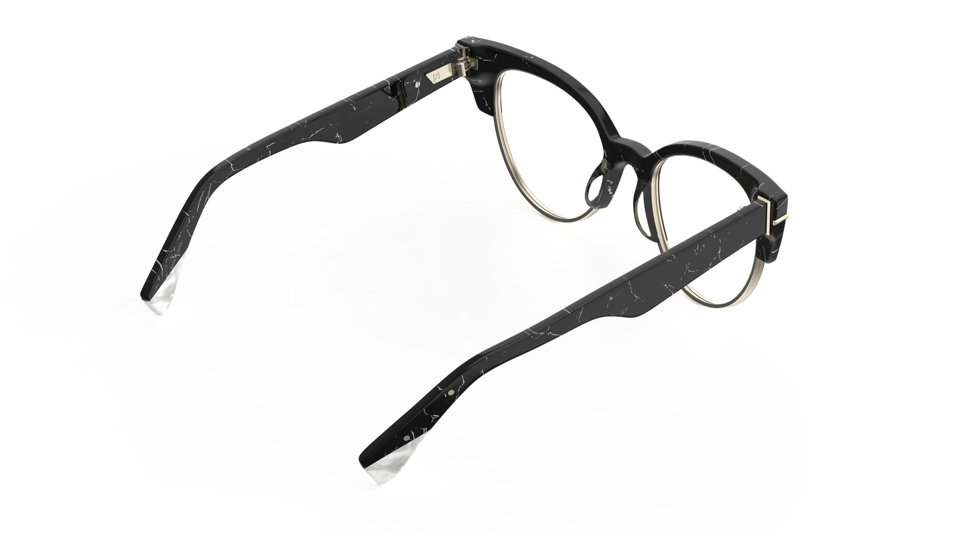 A rear view of a black and white marble cateye frame eyeglasses with silver metal rims, shown on a plain white background.