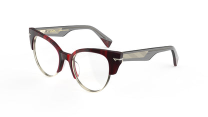 A pair of cat-eye eyeglasses featuring a dark red merlot colored front with sculpted rivets, translucent gray acetate temples featuring a geometric patterned metal wire core.