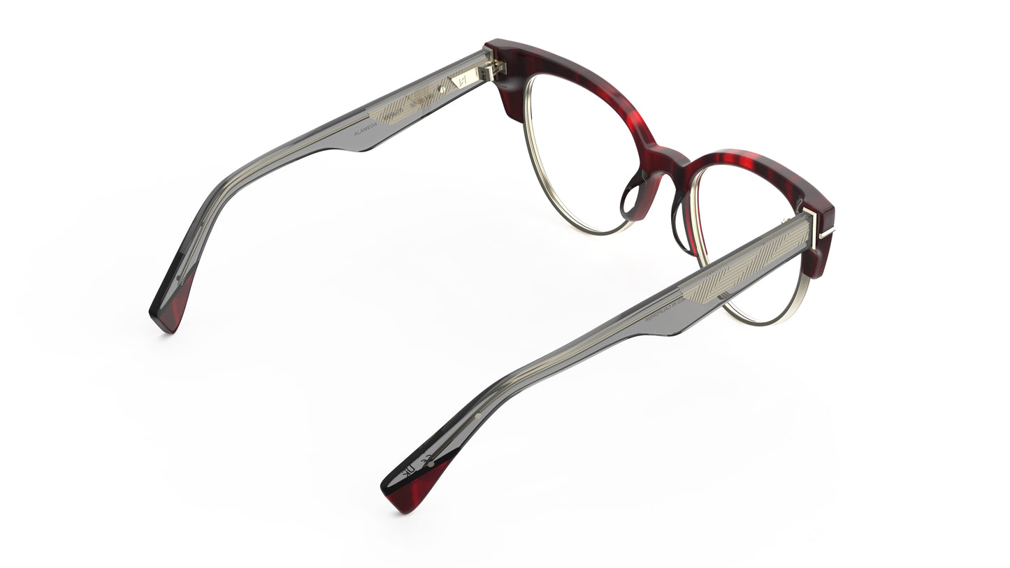 Rear view of cateye eyeglasses with dark red merlot acetate frames and gray temples, shown on a plain white background.