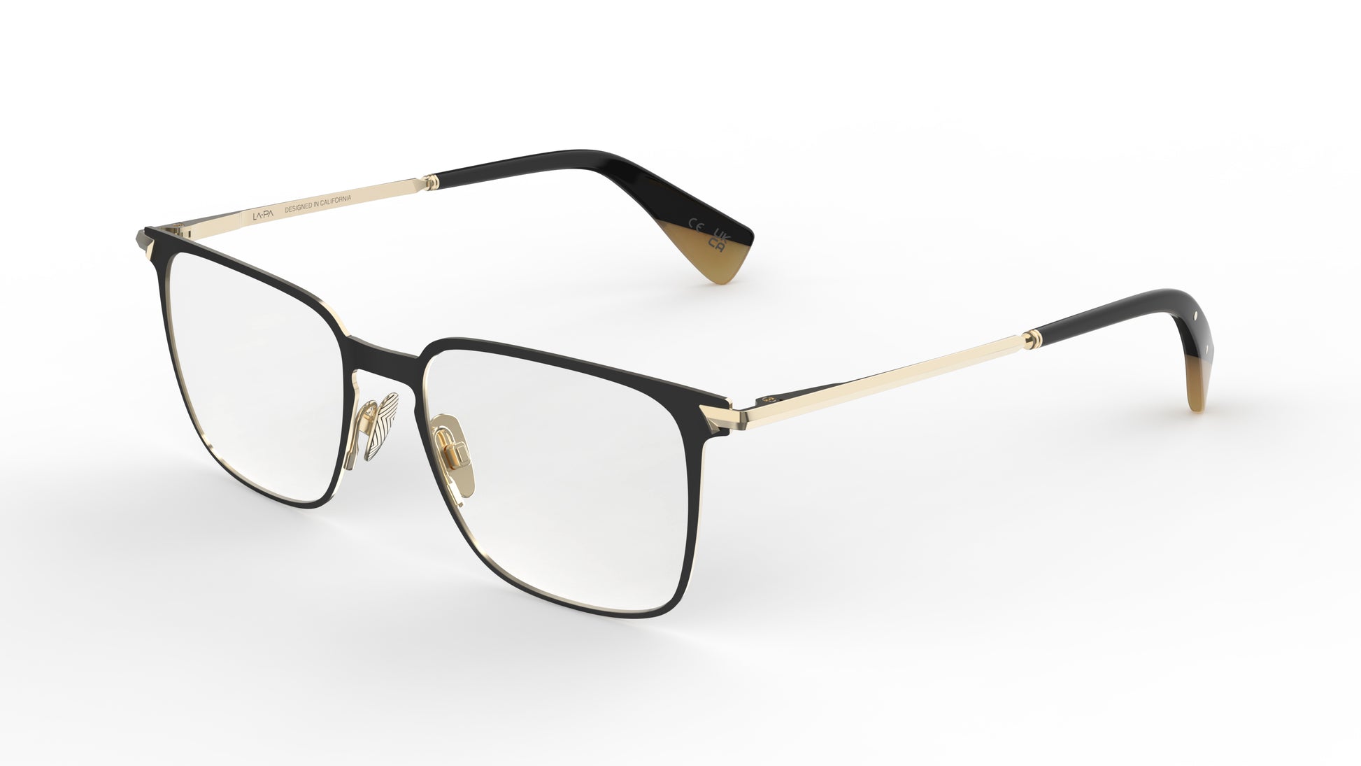 A pair of quality titanium eyeglasses with a black titanium front and light gold sculpted titanium temples and nosepads, shown on a clean white background.