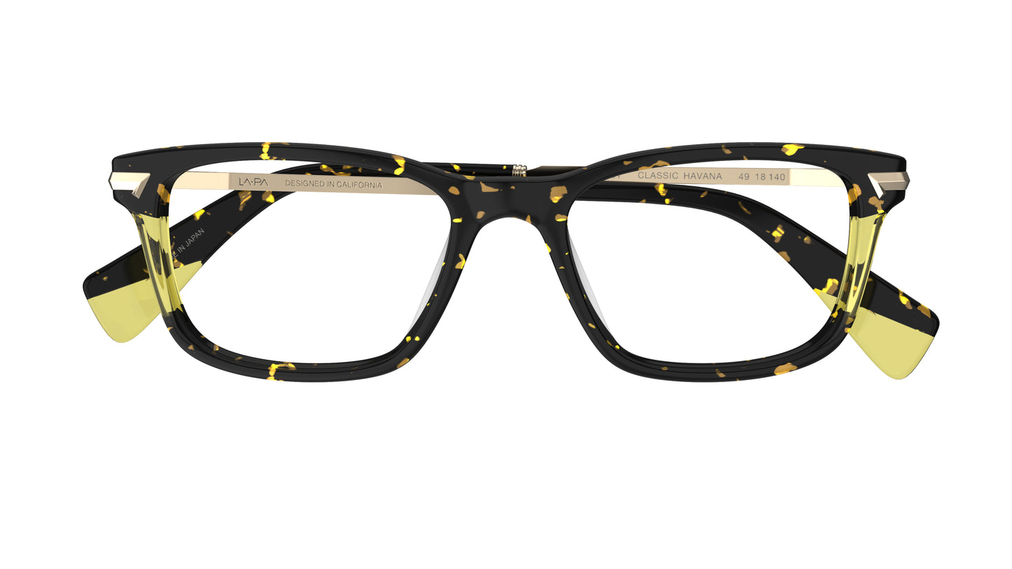 A pair of square eyeglasses with a classic tortoiseshell acetate frame, featuring yellow lamination accents, set against a plain white background.