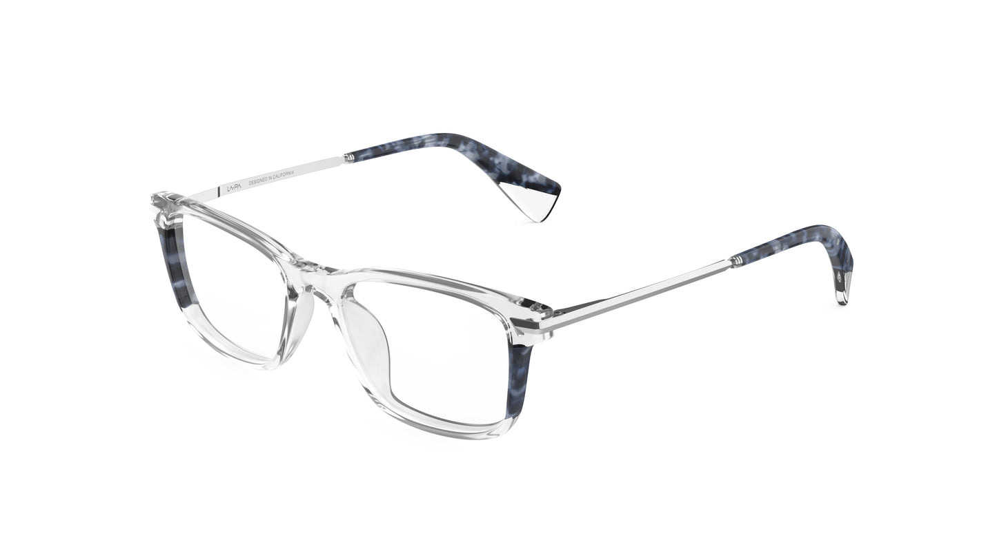 Clear and navy havana acetate eyeglass frames with silver titanium temples, integrated spring hinges, shown on a plain white background.