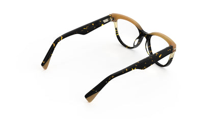 A rear view of a pair of cat-eye eyeglasses featuring a two-tone design with tortoiseshell acetate front and temples, with tan brows and temple tips, shown on a plain white background.
