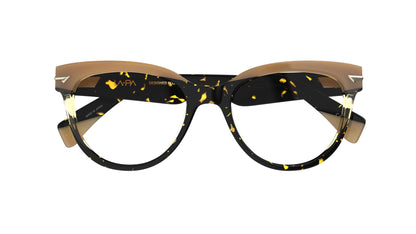 A pair of designer cat-eye ceyeglasses featuring a tortoiseshell acetate front with with a tan brow accent, shown against a plain white background.
