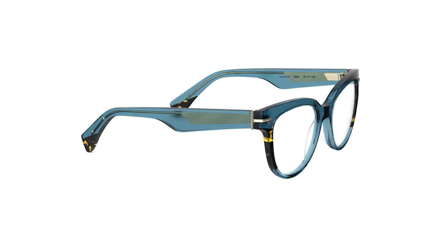 A cat-eye eyeglasses in translucent teal acetate with tortoiseshell accents, geometric patterned metal wire core, shown from a three-quarters angle on a white background.