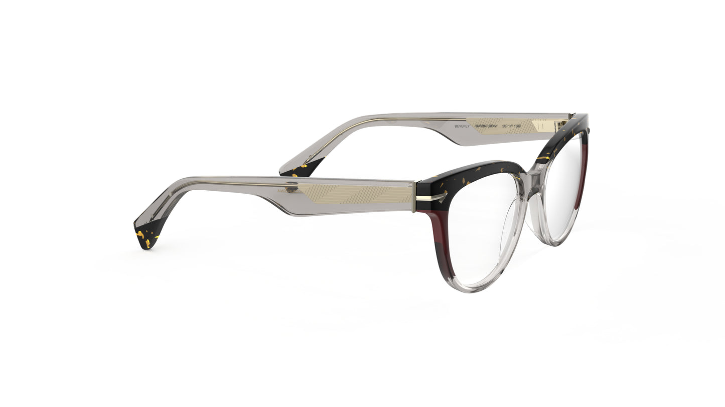 A pair of cat-eye eyeglasses featuring a translucent warm gray acetate front, a tortoiseshell upper brow, and burgundy accents with metal wire cores shown from a three-quarters angle on a white background.