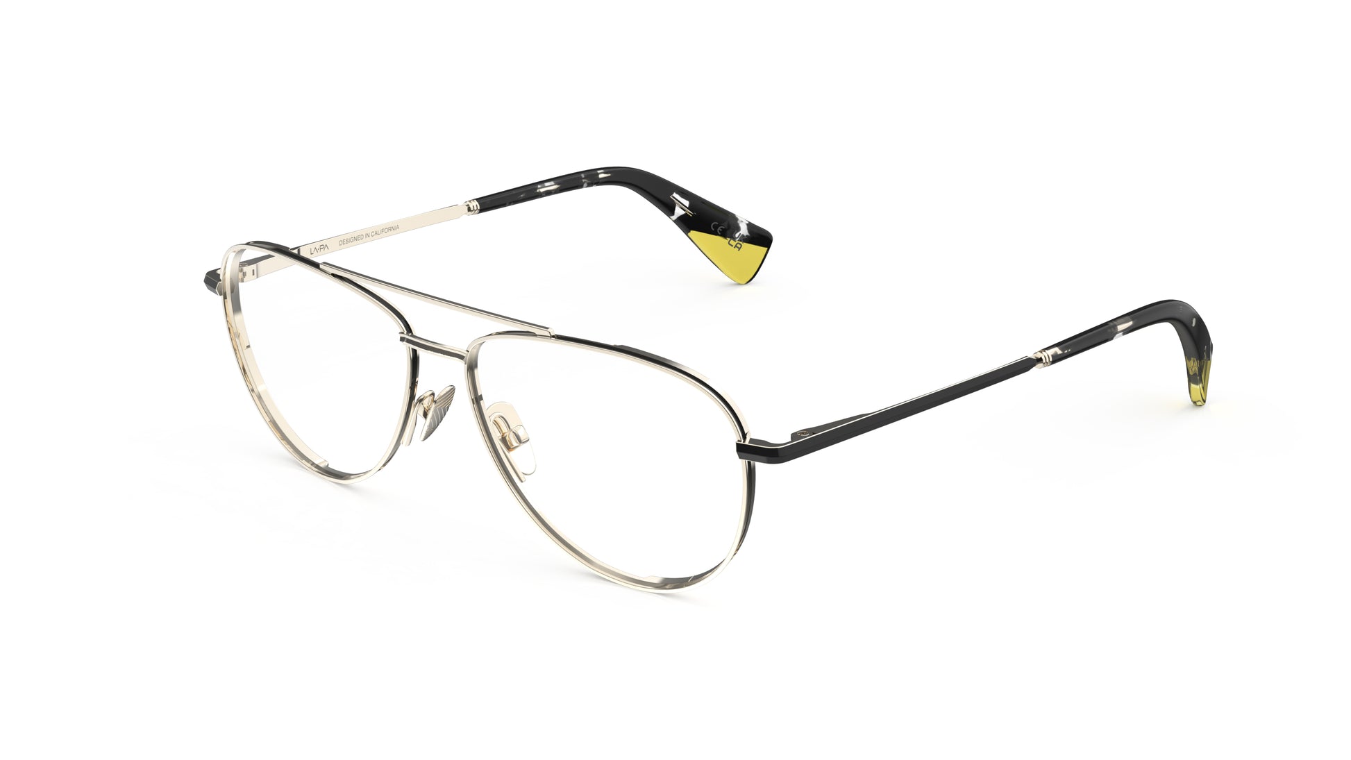 A pair of aviator-style eyeglasses with light gold titanium construction, and dark tortoiseshell temple tips with yellow accents, integrated spring hinge shown on a plain white background.