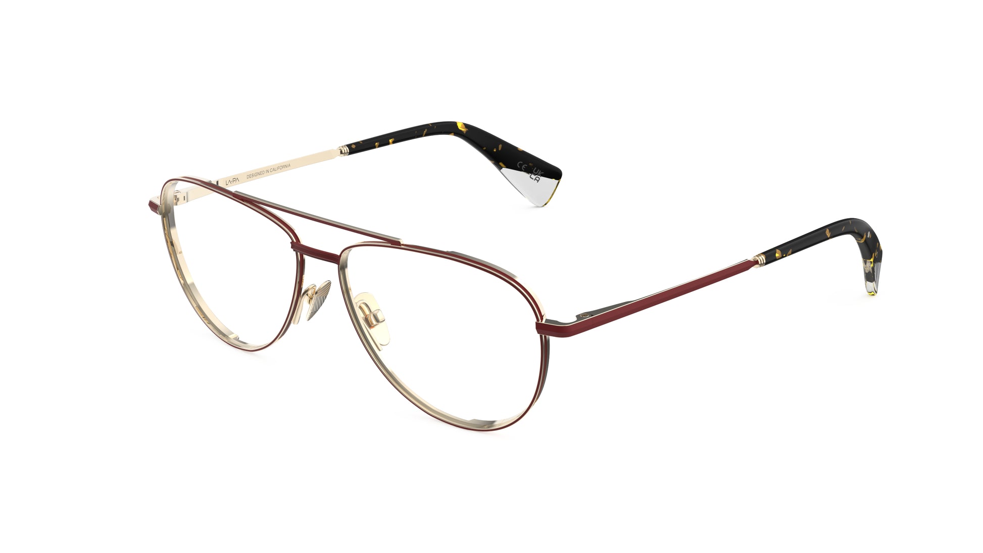 A pair of aviator-style eyeglasses with two tone titanium frame in a red and gold finish, titanium nosepads, and integrated spring hinge, shown on a white background.