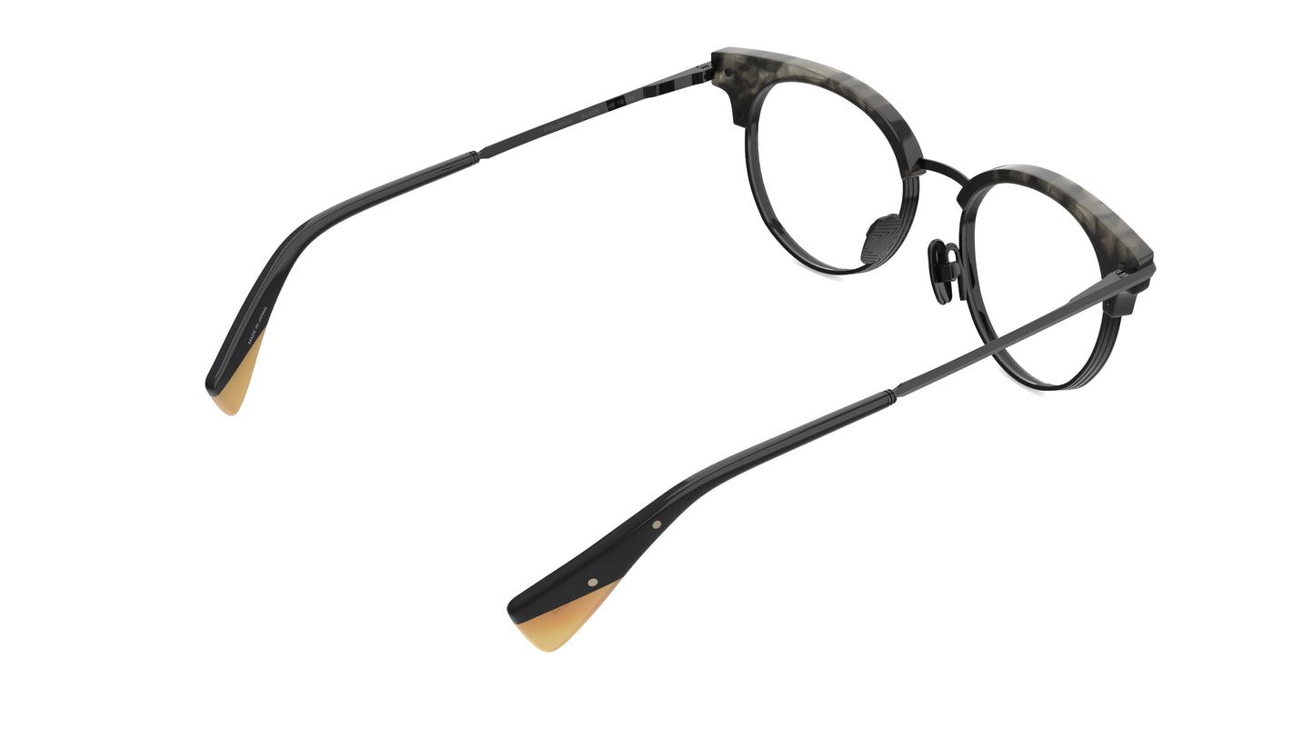 rear view of a clubmaster eyeglasses with a black titanium frame and dark gray tortoise acetate brows, titanium nosepads featuring light tan temple tips, shown on a plain white background.