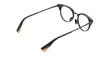 rear view of a clubmaster eyeglasses with a black titanium frame and dark gray tortoise acetate brows, titanium nosepads featuring light tan temple tips, shown on a plain white background.