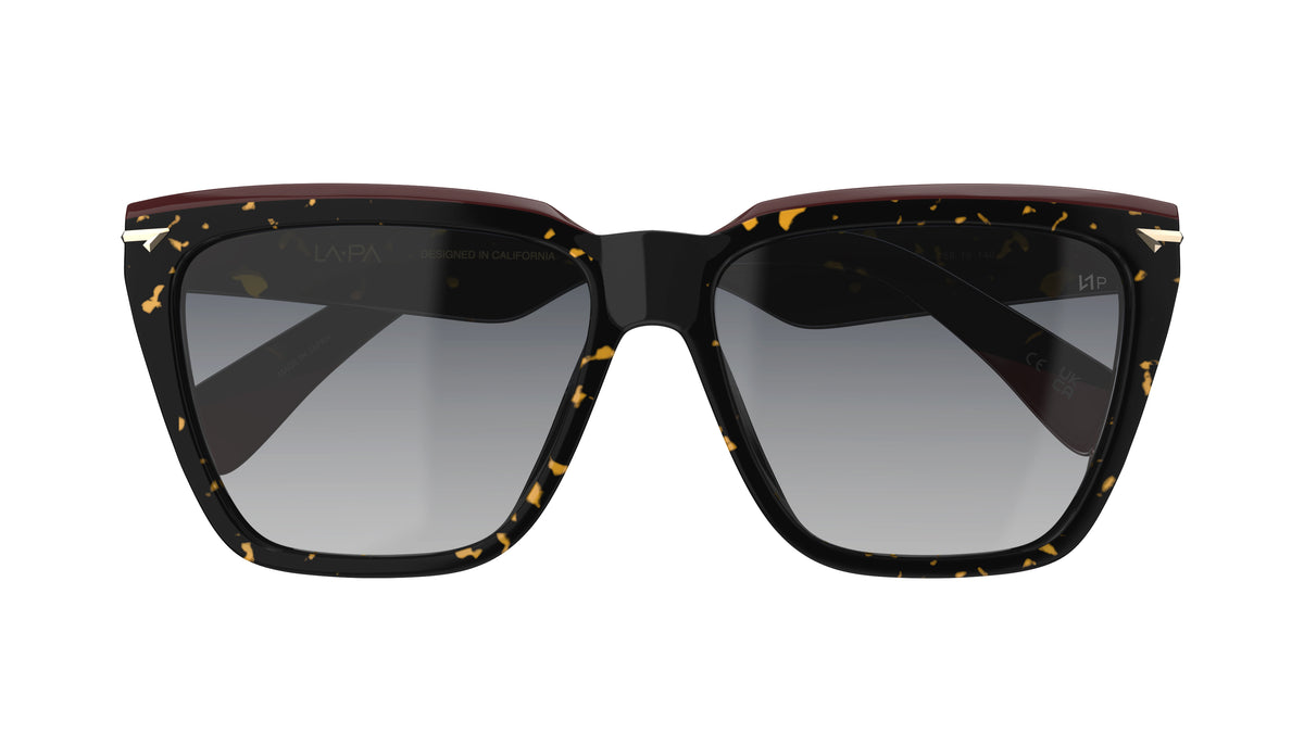 A pair of oversized square sunglasses with a havana acetate with a dark red lamination brow, dark gray gradient polarized lenses, shown against a plain white background.
