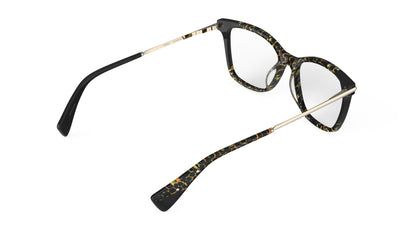 Rear view of butterfly eyeglasses featuring a black and animal print pattern on the front, with gold titanium temples, integrated spring hinge, shown on a plain white background.