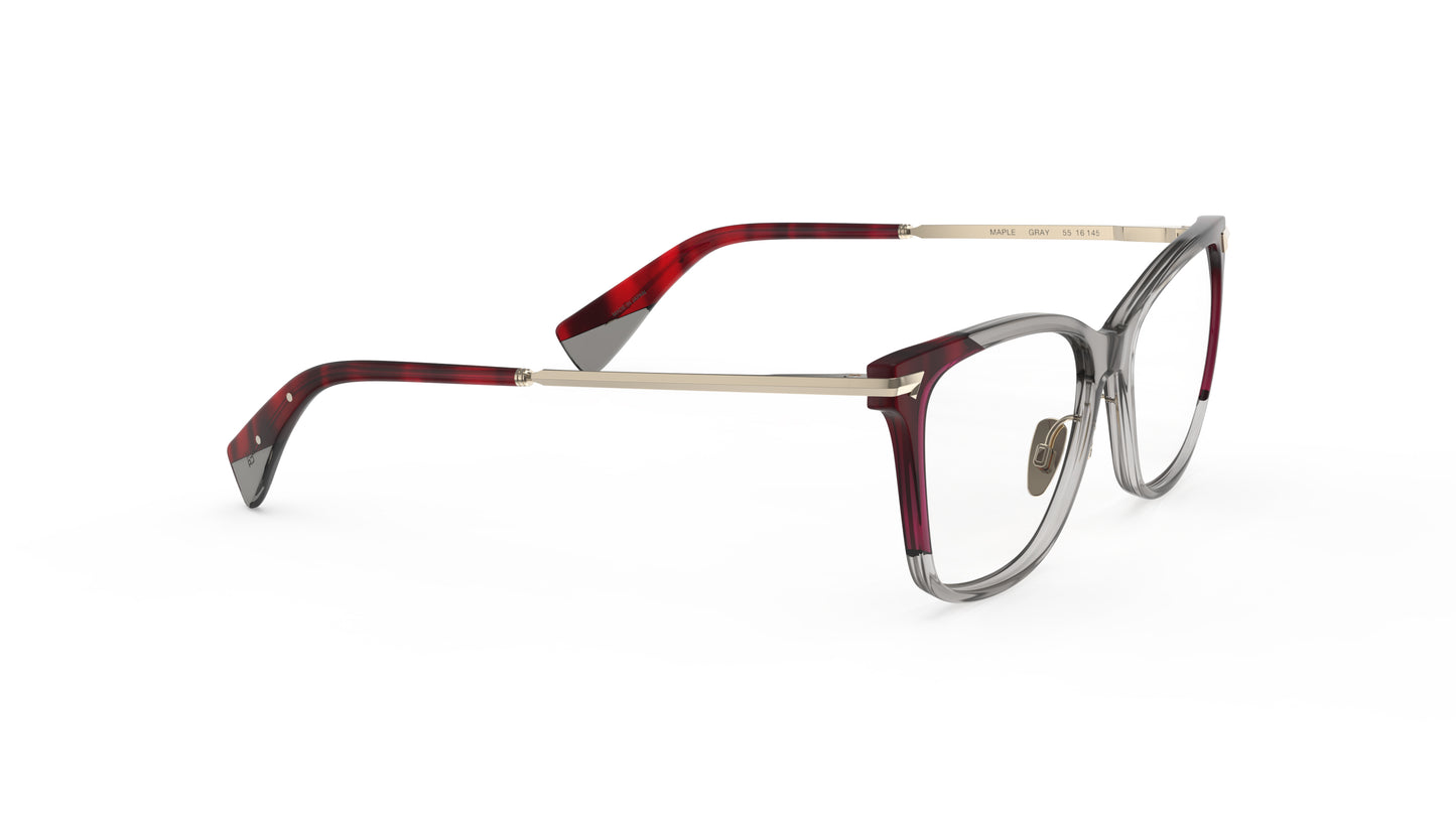 A pair of butterfly eyeglasses with a translucent smoky gray acetate frame, light gold titanium temples and nosepads, and dark striated red acetate tips, integrated spring hinge, shown on a plain white background.