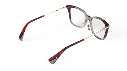 Rear view of butterfly shape eyeglasses with a dark gray frame, featuring light gold titanium temples and nosepads, red striated acetate accents.