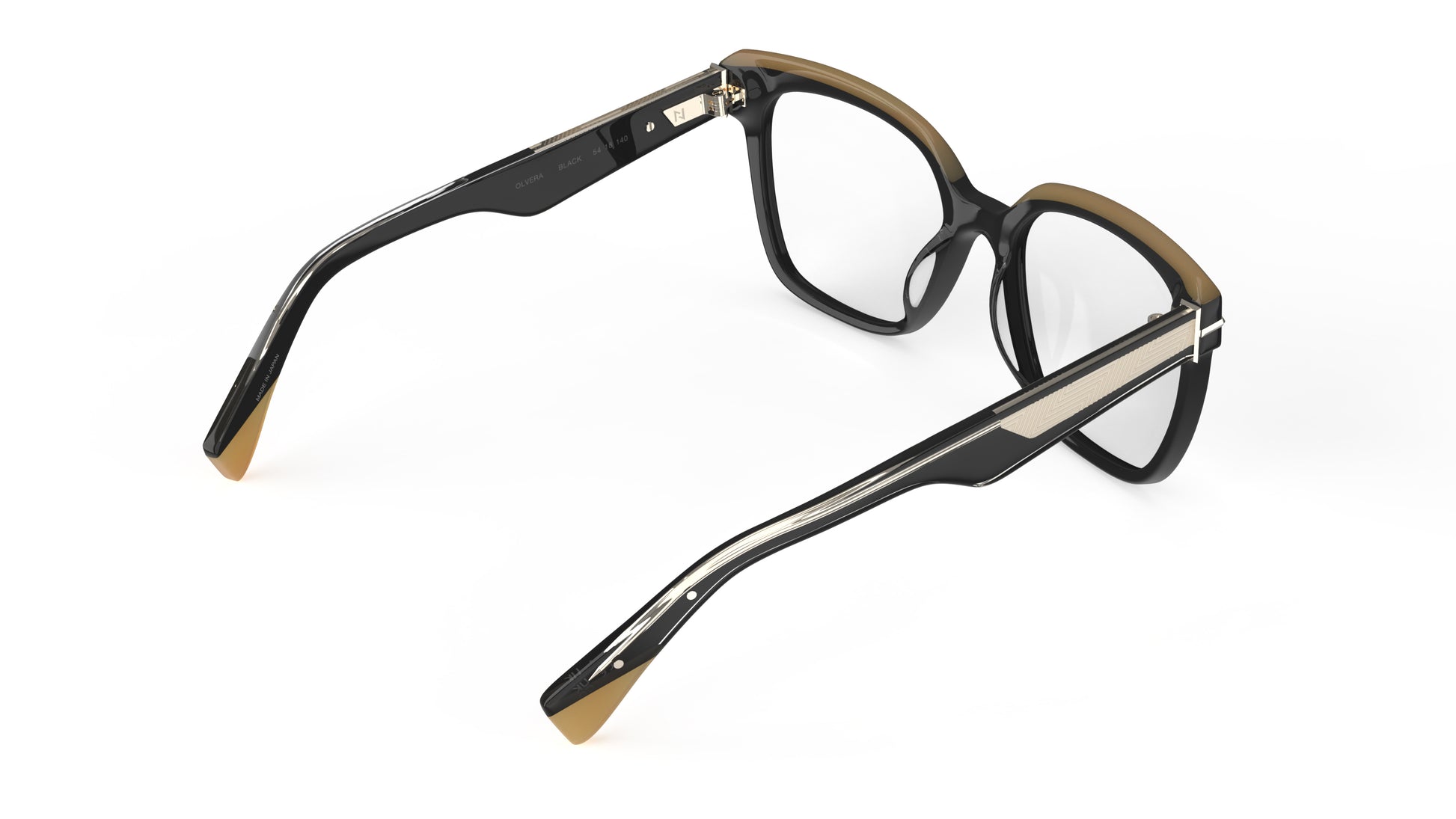 A rear view of a pair of oversized square eyeglasses featuring a black acetate frame with a contrasting tan accent on the top rims and  metal inner temple wire cores, shown on a plain white background.