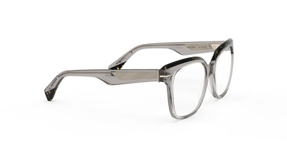 A pair of oversized square eyeglasses with a translucent warm gray acetate frame with a geometric patterned metal wire core, shown on a plain white background.