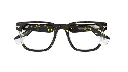 A pair of square-frame eyeglasses with a havana acetate frame, featuring clear accents and clear temple tips. Sculpted rivets on the end pieces.