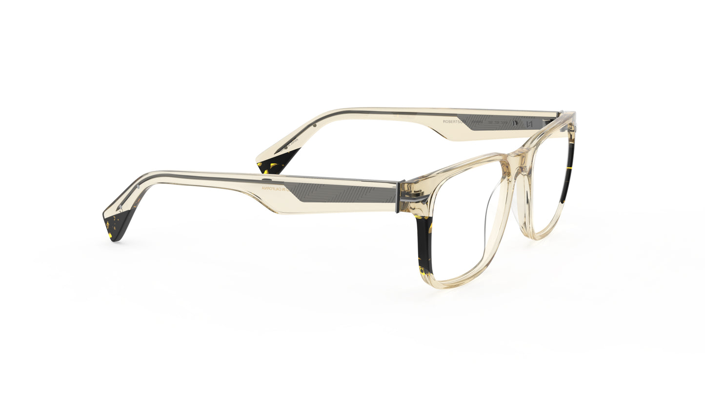 A pair of square-frame eyeglasses with a translucent khaki acetate frame and tortoiseshell-patterned accents, geometric patterned metal wire core, shown on a plain white background.