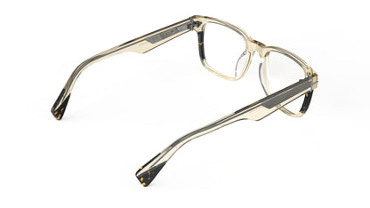 A pair of eyeglasses with a translucent khaki acetate frame and dark tortoiseshell temple tips, shown from a rear three-quarters angle on a white background.