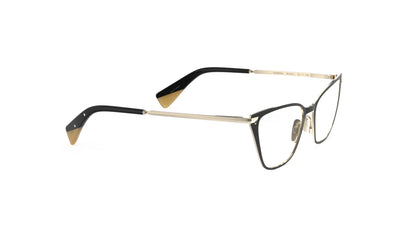 A pair of angular cateye eyeglasses with a black titanium front and gold titanium temples with an integrated spring hinge, shown on a plain white background.