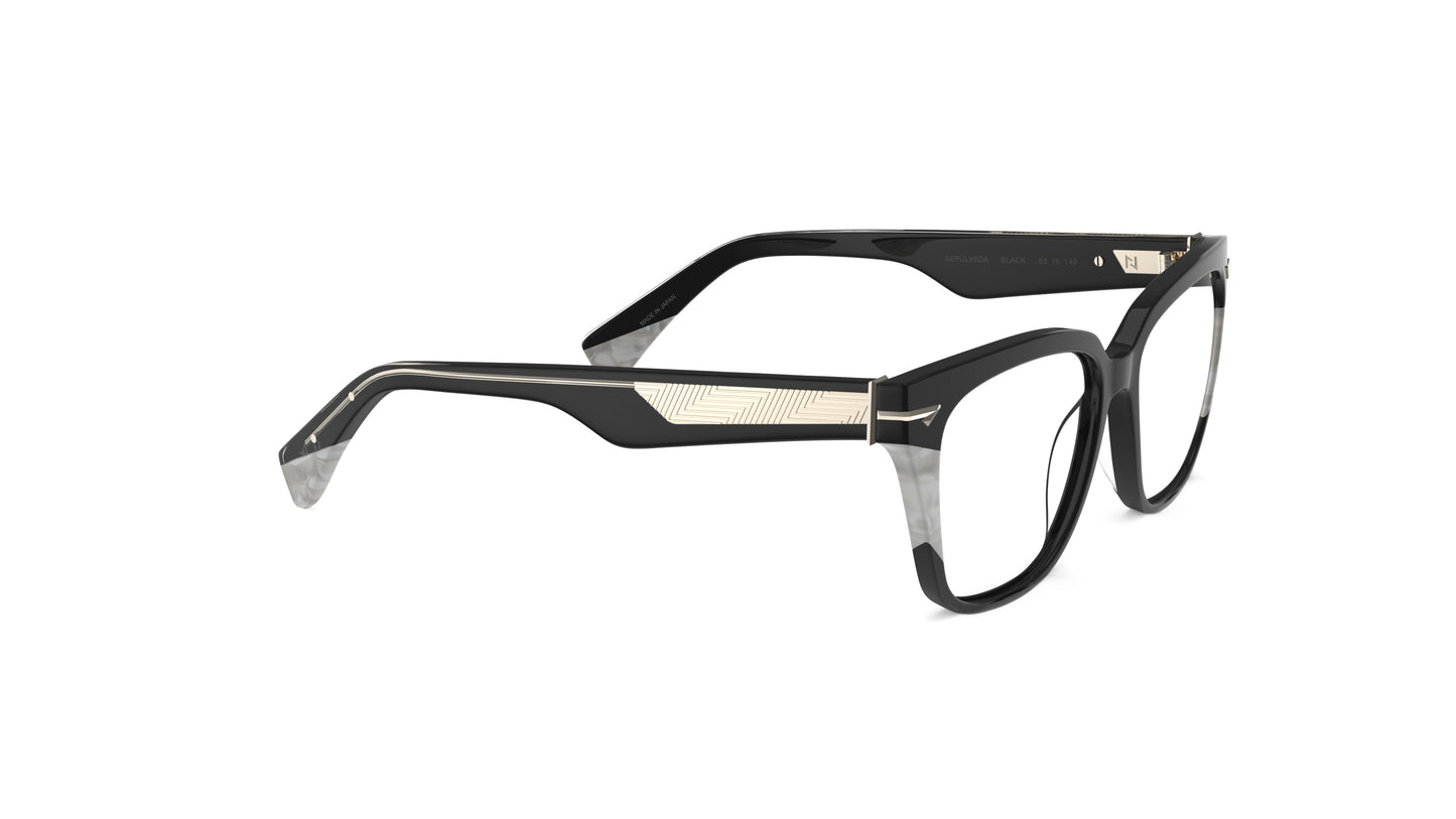 A pair of square eyeglasses with a black acetate front with white pearl accents, geometric patterned metal wire cores shown on a plain white background.