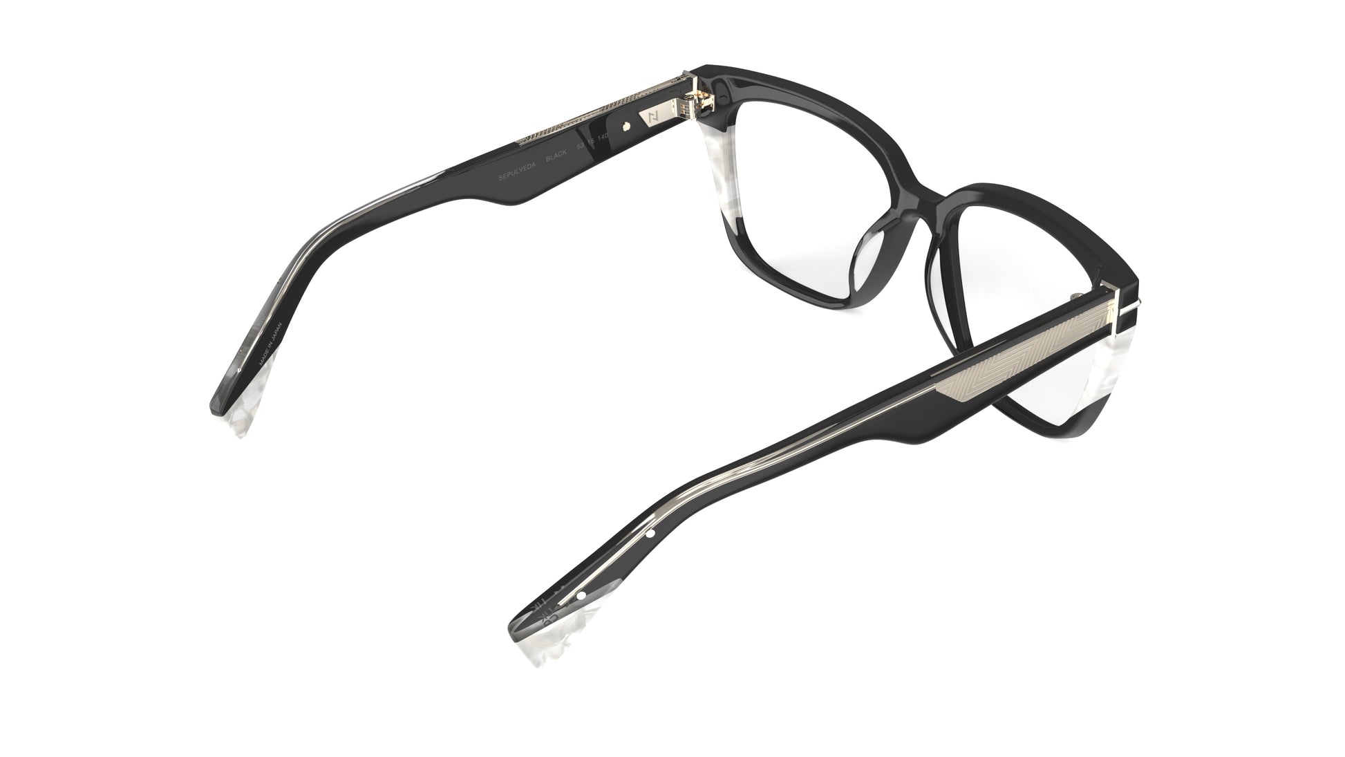 A rear view of a pair of square eyeglasses with a black acetate front with white pearl accents, geometric patterned metal wire cores, shown on a plain white background.