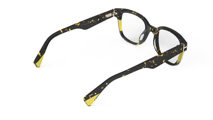 A rear view of pair of square eyeglasses with a dark tortoiseshell pattern on the front and temples, featuring yellow accents, shown on a plain white background.