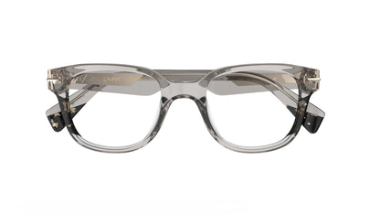 A pair of translucent warm gray acetate eyeglasses with smoky tortoise accents shown against a plain white background.