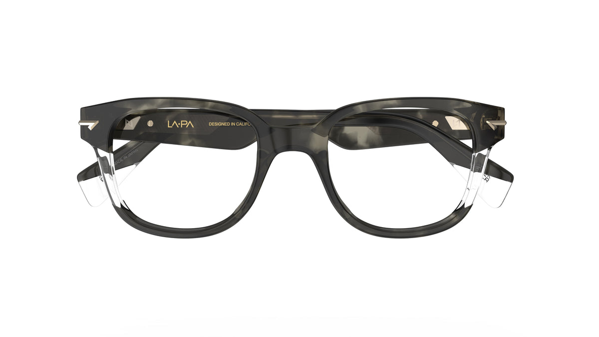 LAPA acetate eyeglasses with a dark green tortoiseshell acetate frame, clear acetate accents, shown against a plain white background.