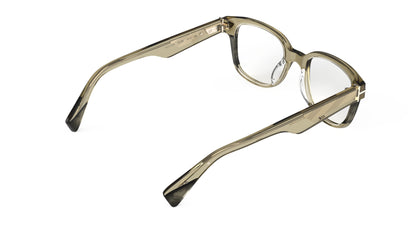A rear view of a pair of semi-transparent olive green acetate eyeglass frames, shown from a three-quarters perspective on a white background.