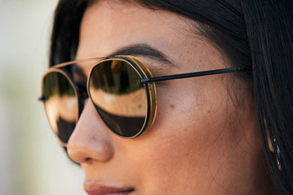 Woman wearing Black Pilot Sunglass with Yellow Blinders